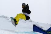 Keith Gabel of the United States of America competes in the Snowboard Cross Adaptive Standing Men