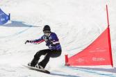 Heid-Jo Duce on her snowboard at a slalom event. 