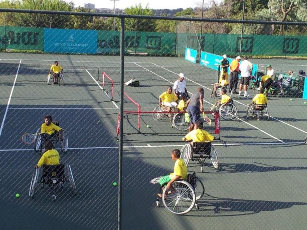 South Africa wheelchair tennis A picture of person in wheelchairs playing tennis