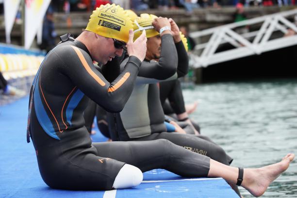 Mark Barr A picture of a man without his right leg preparing himself to a swimming race