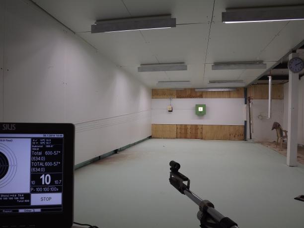 Jason Maroney built his own rifle range with a world class electronic target machine in his shed