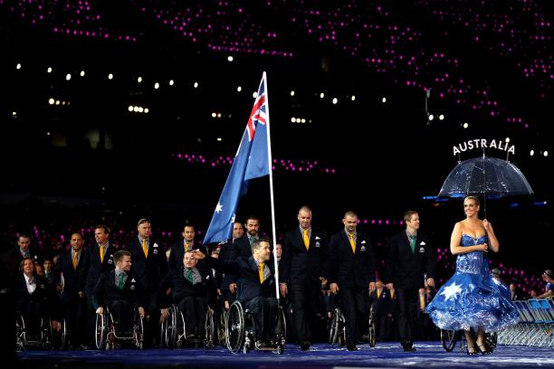 Australian at London 2012 Opening Ceremony An athlete carries Australia's flag through the stadium at the London 2012 Opening Ceremony.