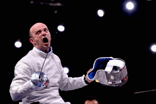 Alessio Sarri A wheelchair fencer celebrates after a victory.