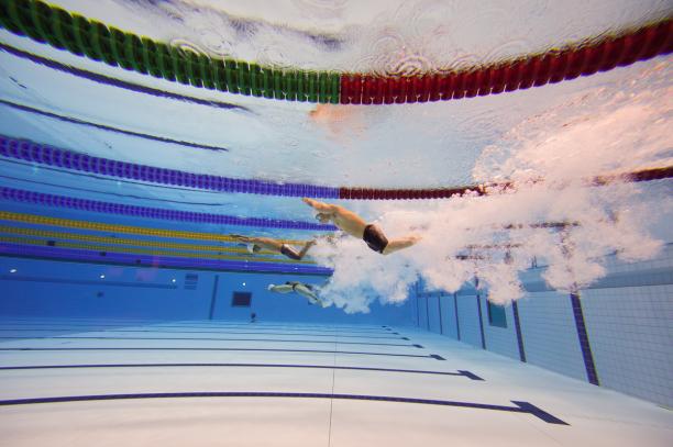 Under water shot of men's race, diving
