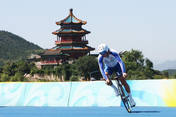 Cyclist in front of the forbidden city during the Beijing 2008 Paralympic Games.