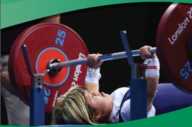 Zoe Newson A picture of a woman competing in a powerlifitng competiton