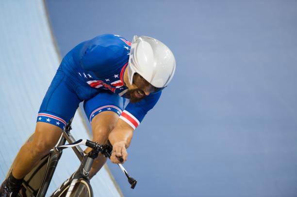 Joseph Berenyi A picture of a man with one arm cycling during pursuit race.
