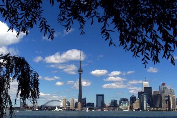 Toronto A view of the skyline of Toronto featuring tall buildings and the CN Tower.