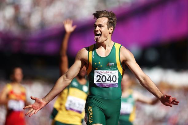 Evan O'Hanlon A picture of a man celebrates the victory after crossing the line