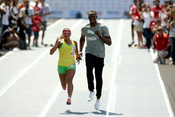 Terezinha Guilhermina Usain Bolt Brazilian Paralympian Terezinha Guilhermina runs with Usain Bolt of Jamaica as her guide during an exhibition in preparation for the Mano a Mano Athletics Challenge at the Jockey Club Brasileiro in Rio de Janeiro, Brazil.