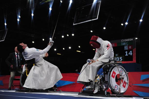 Wheelchair Fencing Athletes practicing wheelchair fencing.