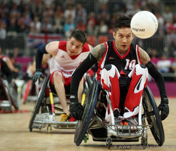 Trevor HIRSCHFIELD, Canada races after the ball in his wheelchair