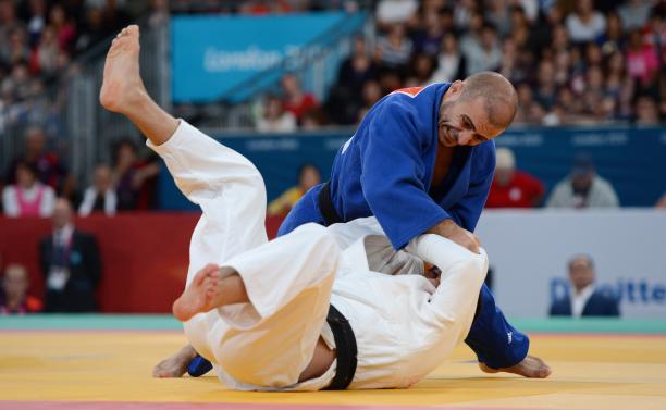 Davyd Khorava and Xu Zhao - Ukraine and China - London 2012 - judo Two men practising judo