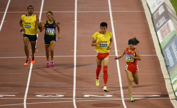 China's Jin Zheng celebrates winning the women's 1500m T11 final during the 2015 IPC Athletics World Championships.