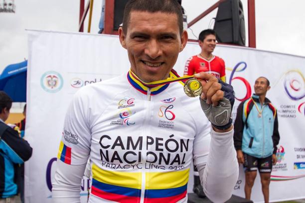 Alvaro Galvis - Colombia - cycling Man with cycling jersey showing his medal, smiling