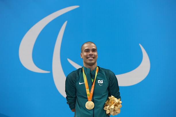 Gold medalist Daniel Dias of Brazil Gold medalist Daniel Dias of Brazil celebrates on the podium at the medal ceremony for the Men's 200m Freestyle - S5 Final on day 1 of the Rio 2016 Paralympic Games