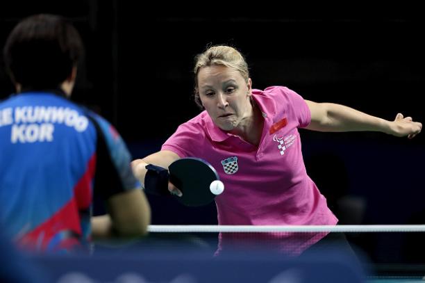 Sandra Paovic of Croatia in action against Kunwoo Lee during the prelimimary round of the Women's's Table Tennis at the Rio 2016 Paralympic Games.