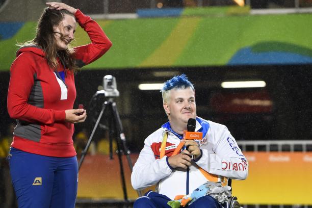 Silver medalist David Drahoninsky of the Czech Republic proposes to his girlfried Lida Fikarova after the medal ceremony for the men's individual archery W1 final atthe Rio 2016 Paralympic Games.