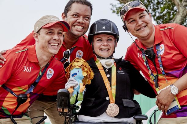 Stinna Tange Kaastrup - Rio 2016 Stinna Tange Kaastrup celebrating her gold medal with volunteers.