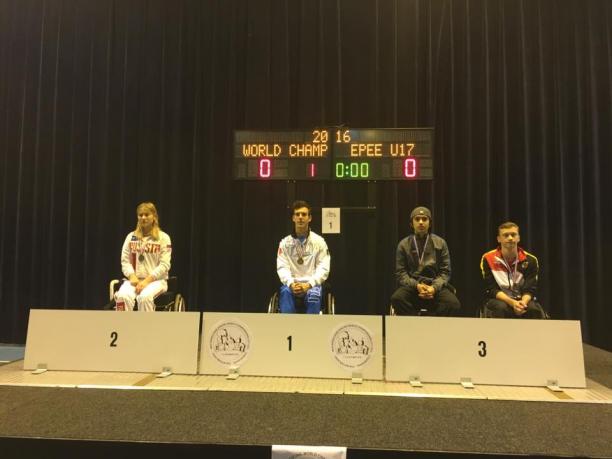 Emanuele Lambertini - Italy - wheelchair fencing Podium with three athletes in wheelchairs