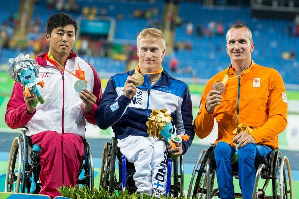 Leo Pekka Tahti - FInland - Rio 2016 Three men in wheelchairs on a podium showing their medals