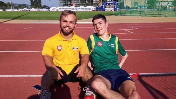Lukas Guscius and Egidijus Valciukas - Nottwil 2017 two male para athletes sit together on the track