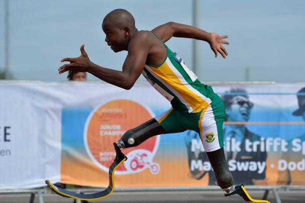South Africa's Ntando Mahlangu Man with double blades sprints