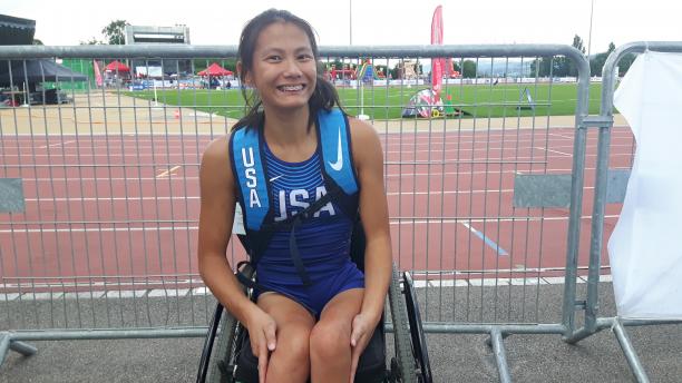 USA's Hannah Dederick Girl in wheelchair smiles for a photo after her race