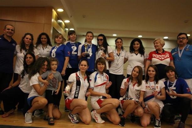Israel goalball clinic a group of goalball athletes smile for the camera