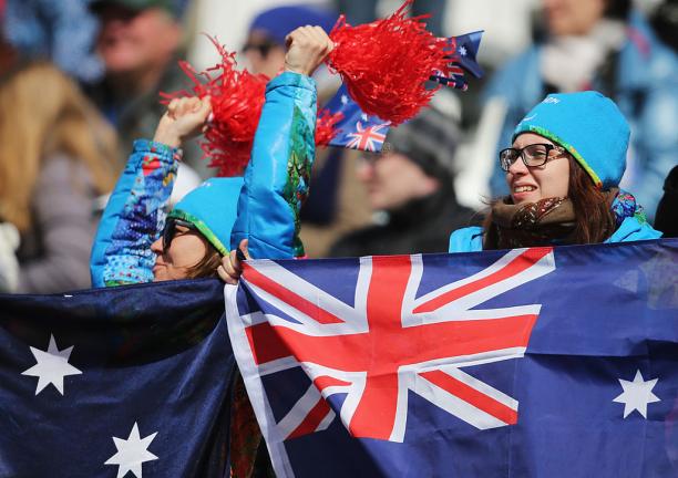 Australian fans in Sochi a group of fans cheer and wave flags