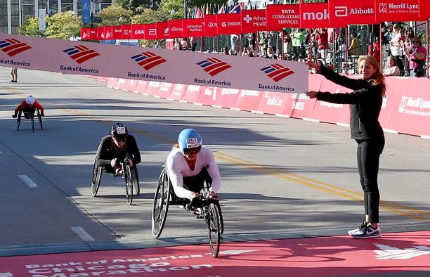 Tatyana McFadden - Chicago Marathon a female wheelchair racer crosses the finish line