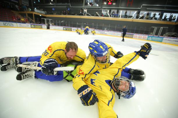 Sweden beats Germany in Ostersund 2017 Para ice hockey players celebrate on the ice