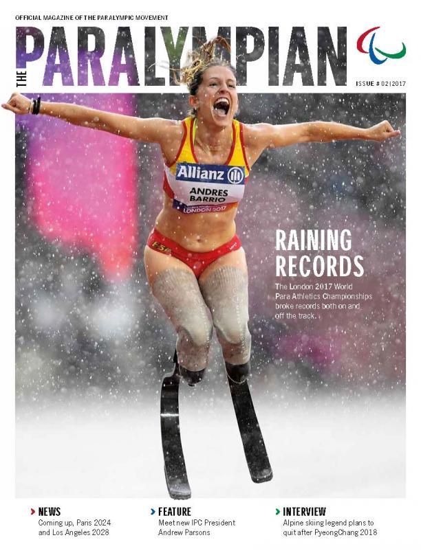 Cover of magazine with female sprinter celebrating in rain