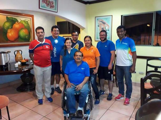 Managua 2018 Chefs de Mission a group of men smile for the camera
