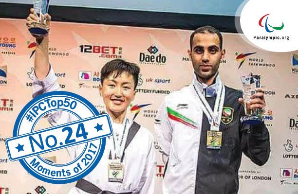 Top 50 Moments No 24 - Enkhtuya Khurelbaatar a female Para taekwondo fighter raises her trophy and smiles