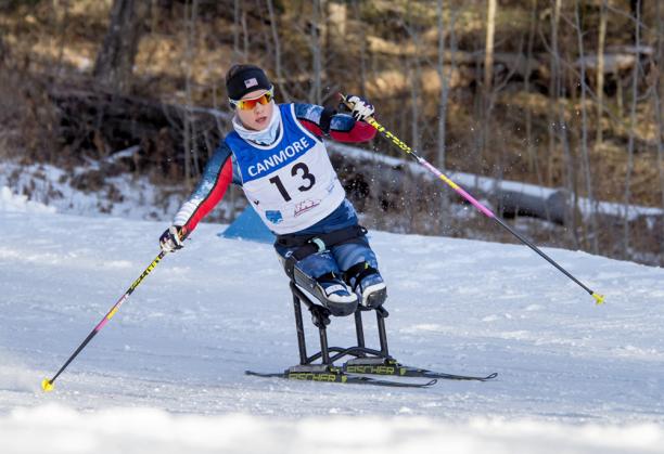 Oksana Masters - Canmore 2017 a female Para Nordic skier races towards the finish line