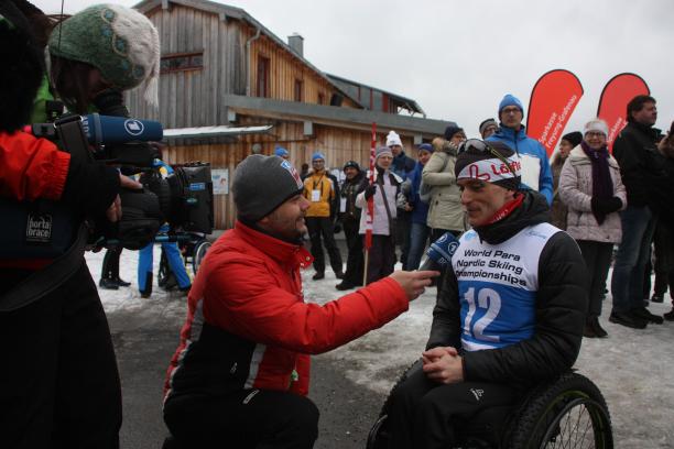 a para Nordic skier being interviewed