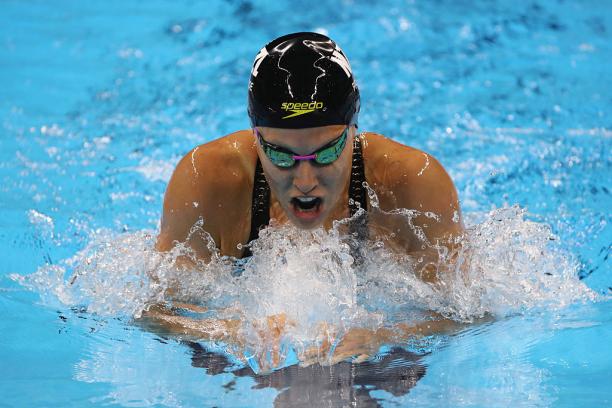 Close up of swimmer doing breast stroke