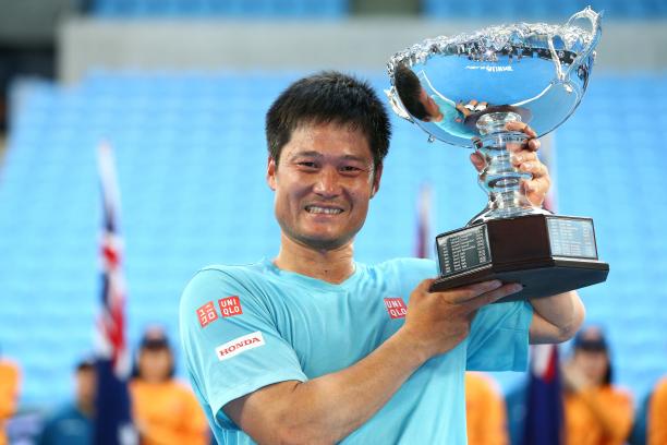 Shingo Kunieda wins Australian Open 2018 Man smiling and lifting a silver trophy