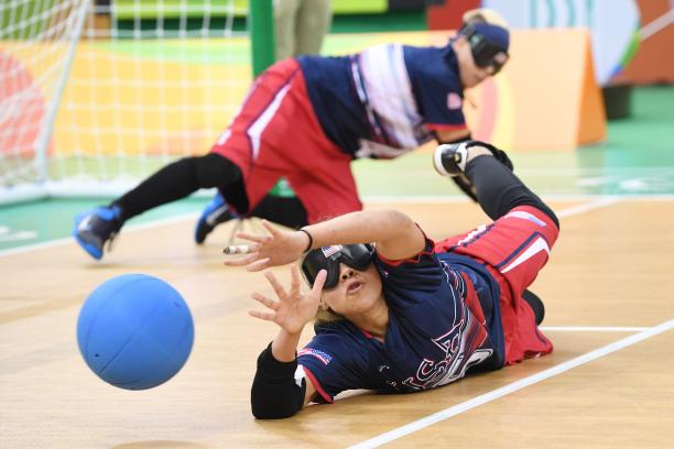 Amanda Dennis a female goalball player saves a shot