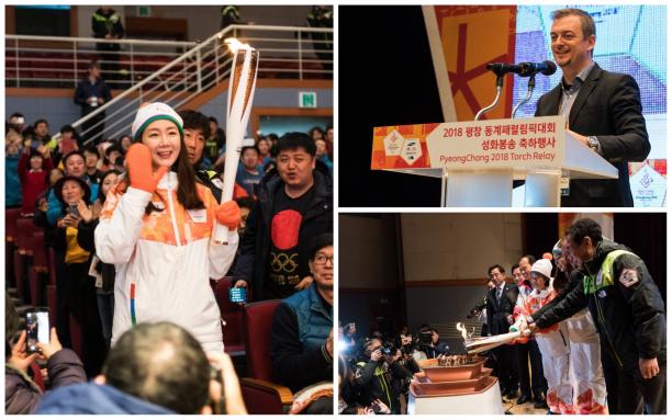 Paralympic Flame Gangneung people carrying a torch and lighting a flame