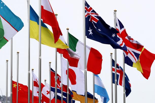 PyeongChang 2018 flags flags from many countries flying in the wind at the Paralympic Village