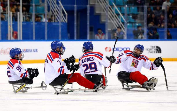 Pavel Kubes - PyeongChang 2018 Para ice hockey players celebrating on the ice