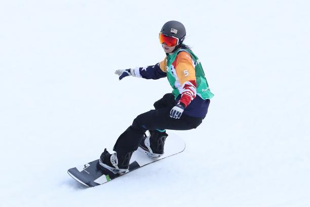 Brenna Huckaby of United States competes in the Snowboard - Women's Snowboard Cross SB-LL1 Athlete in snowboard competition