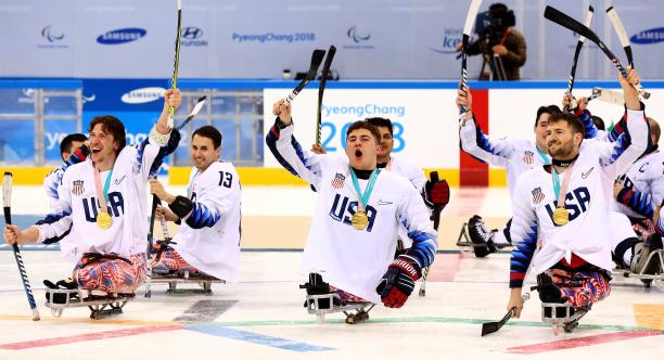 USA win Para ice hockey - PyeongChang 2018 Para ice hockey players celebrating on the ice