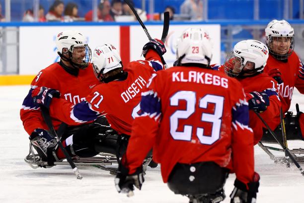 Norway Para ice hockey - PyeongChang 2018 a group of Para ice hockey players celebrate a goal