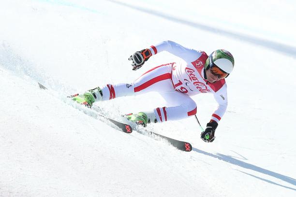a male Para alpine skier in action