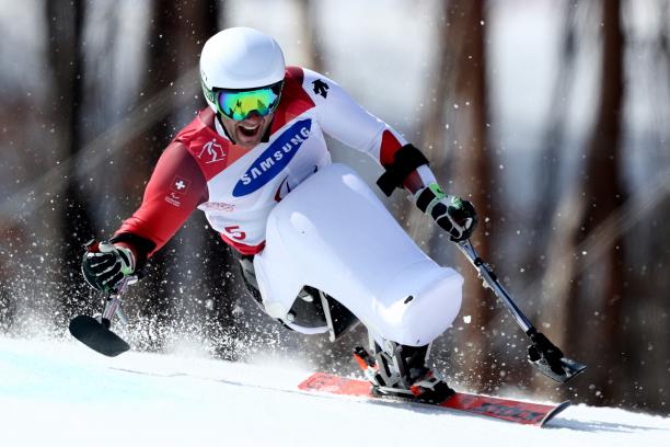 Christoph Kunz - PyeongChang 2018 a male sit skier goes down the slope