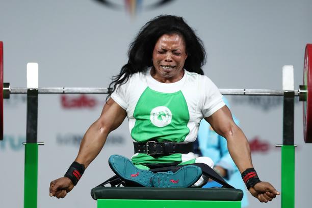 Esther Oyema - Gold Coast 2018 a female powerlifter celebrates on the bench