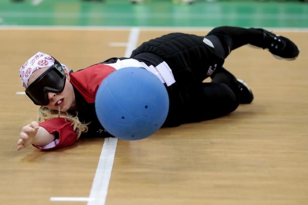 Canada women's goalball a female goalball player saves a shot